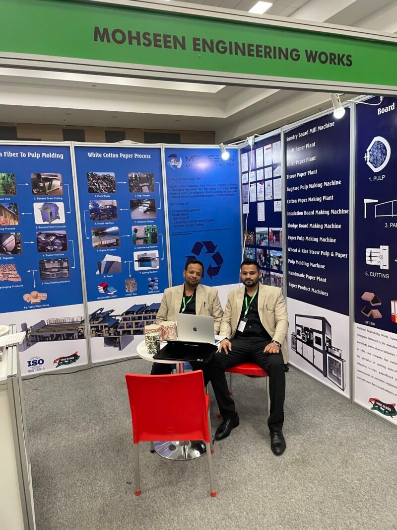 MEW representatives at the exhibition stand